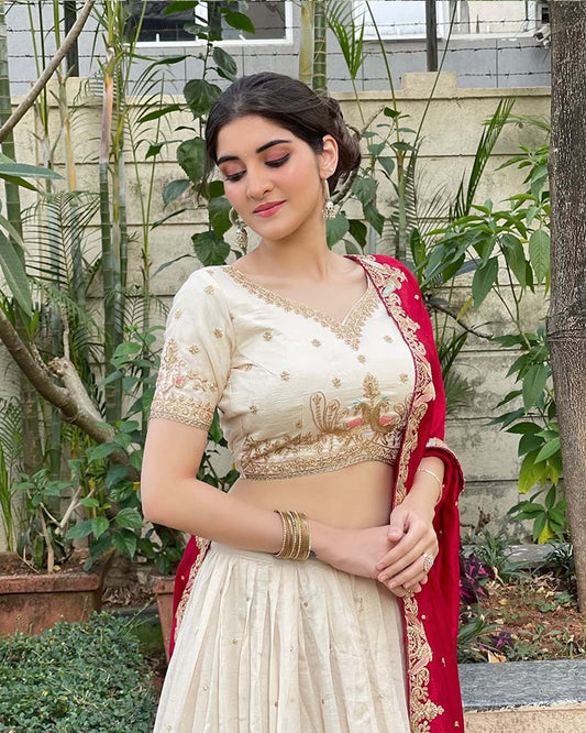 Navika kotia In Off-White Color Vichitra Silk Thread Embroidered Lehenga Choli