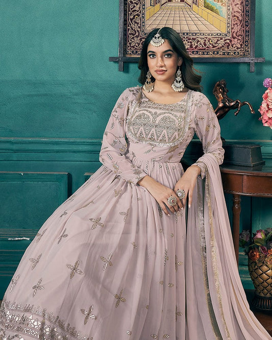 Chiku Color Faux Georgette Metalic Foil Work Gown With Dupatta