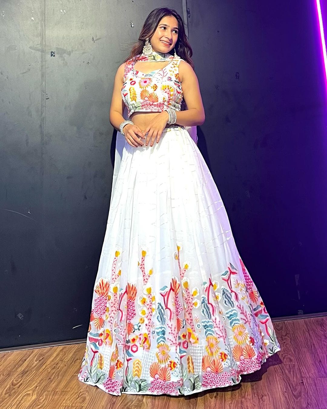 Kiran Rana in White Floral Nine Color Threaded Embroidered Soft Georgette Semi Stitched Lehenga Choli