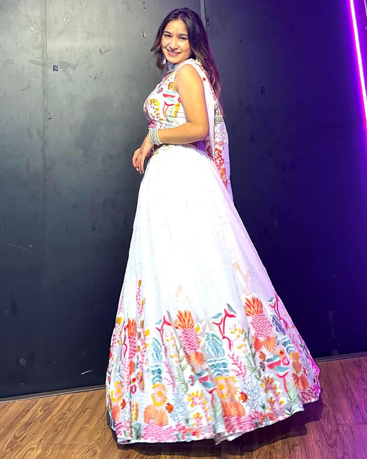 Kiran Rana in White Floral Nine Color Threaded Embroidered Soft Georgette Semi Stitched Lehenga Choli