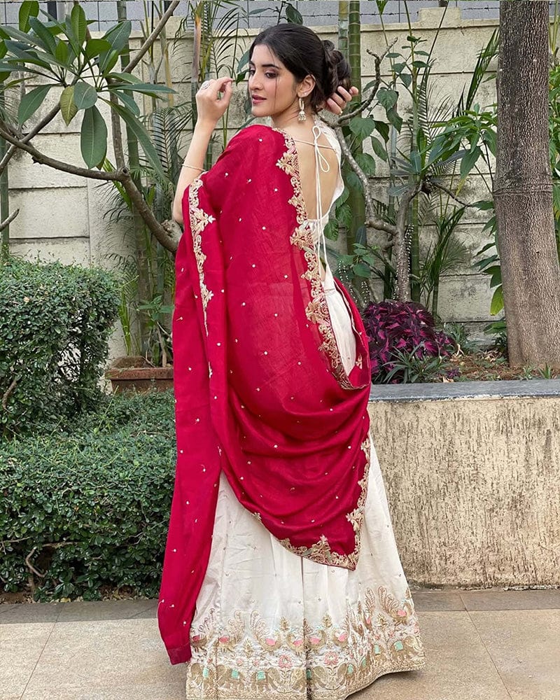Navika kotia In Off-White Color Vichitra Silk Thread Embroidered Lehenga Choli