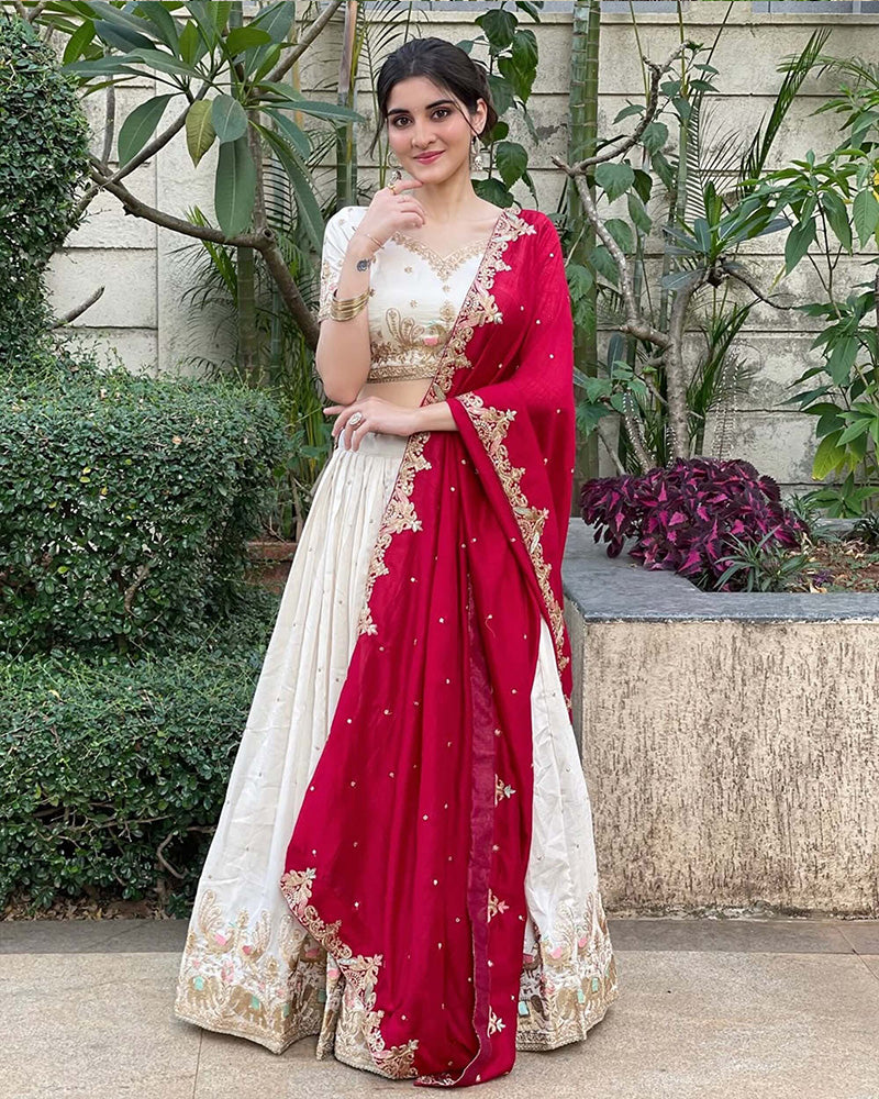 Navika kotia In Off-White Color Vichitra Silk Thread Embroidered Lehenga Choli