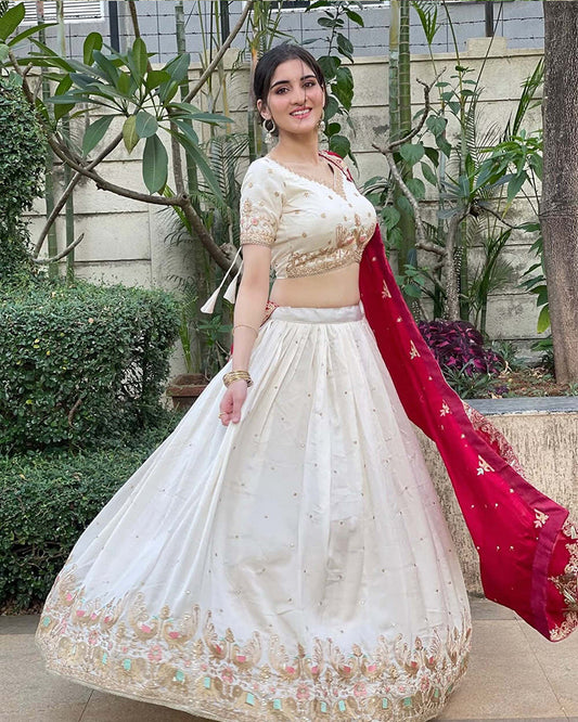 Navika kotia In Off-White Color Vichitra Silk Thread Embroidered Lehenga Choli