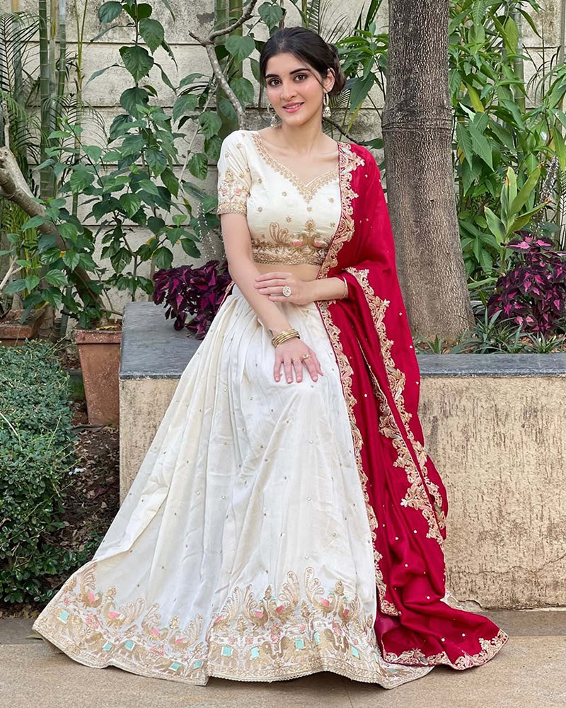 Navika kotia In Off-White Color Vichitra Silk Thread Embroidered Lehenga Choli