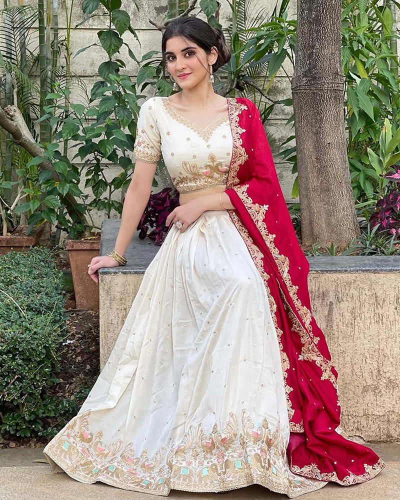 Navika kotia In Off-White Color Vichitra Silk Thread Embroidered Lehenga Choli