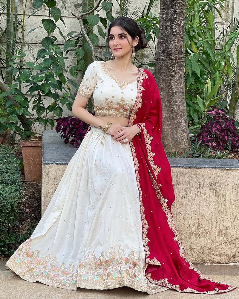 Navika kotia In Off-White Color Vichitra Silk Thread Embroidered Lehenga Choli