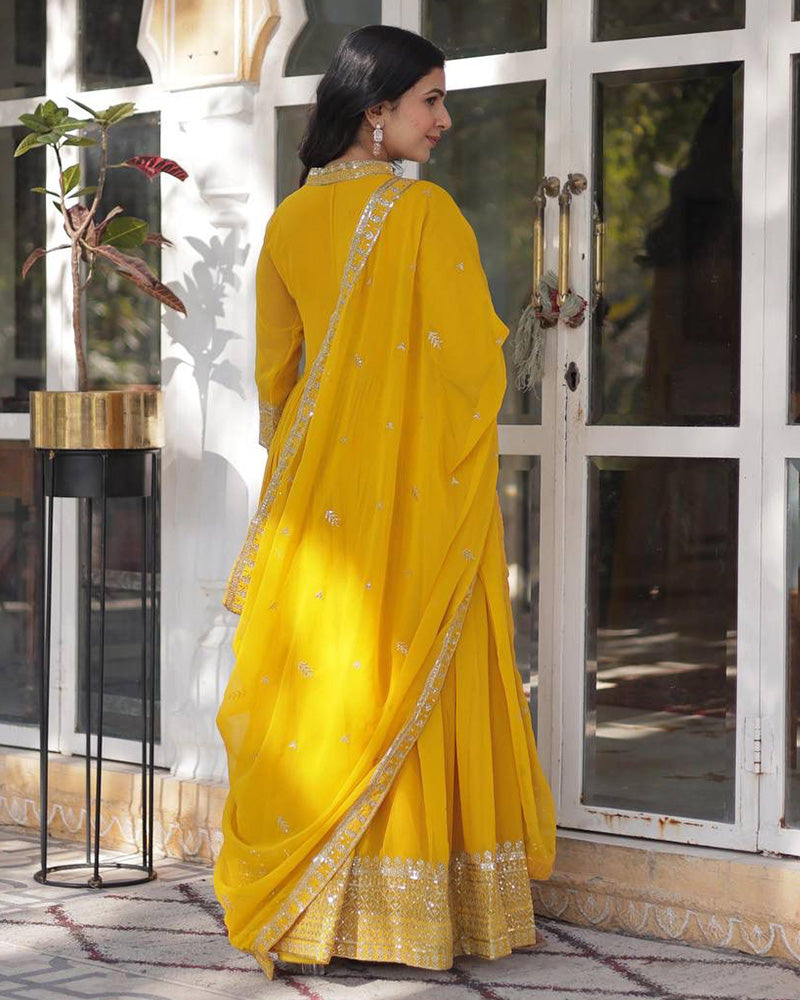 Yellow Color Faux Blooming Rich Embroidered Work Gown