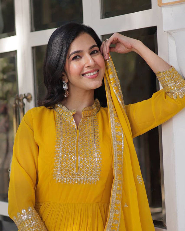 Yellow Color Faux Blooming Rich Embroidered Work Gown