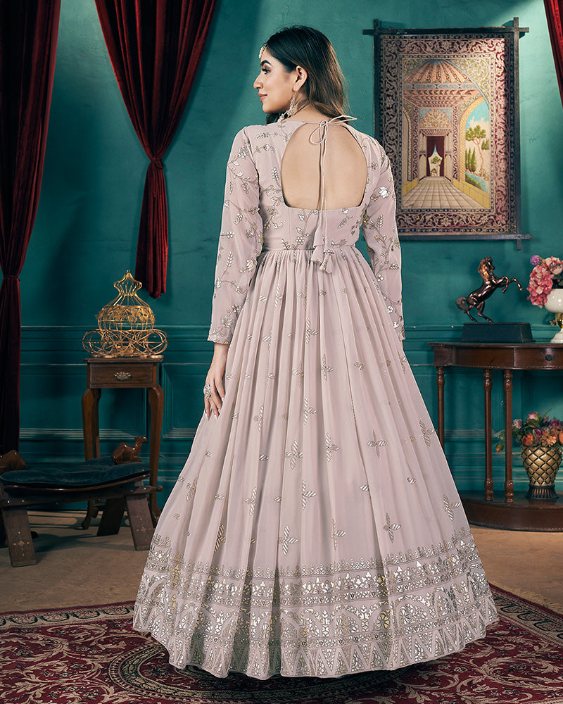 Chiku Color Faux Georgette Metalic Foil Work Gown With Dupatta