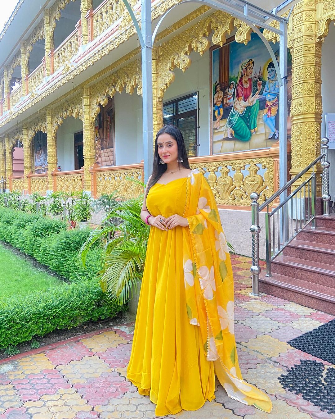 Neha Ghosh in Mustard Yellow Color Soft Georgette Anarkali Gown With Floral Printed Dupatta