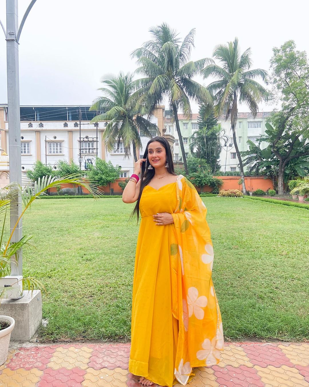 Neha Ghosh in Mustard Yellow Color Soft Georgette Anarkali Gown With Floral Printed Dupatta