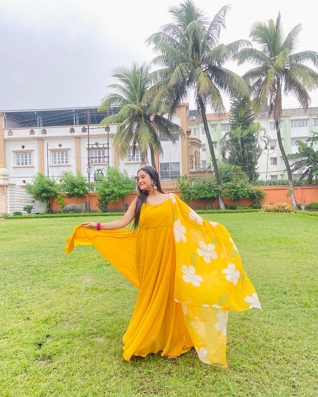 Neha Ghosh in Mustard Yellow Color Soft Georgette Anarkali Gown With Floral Printed Dupatta