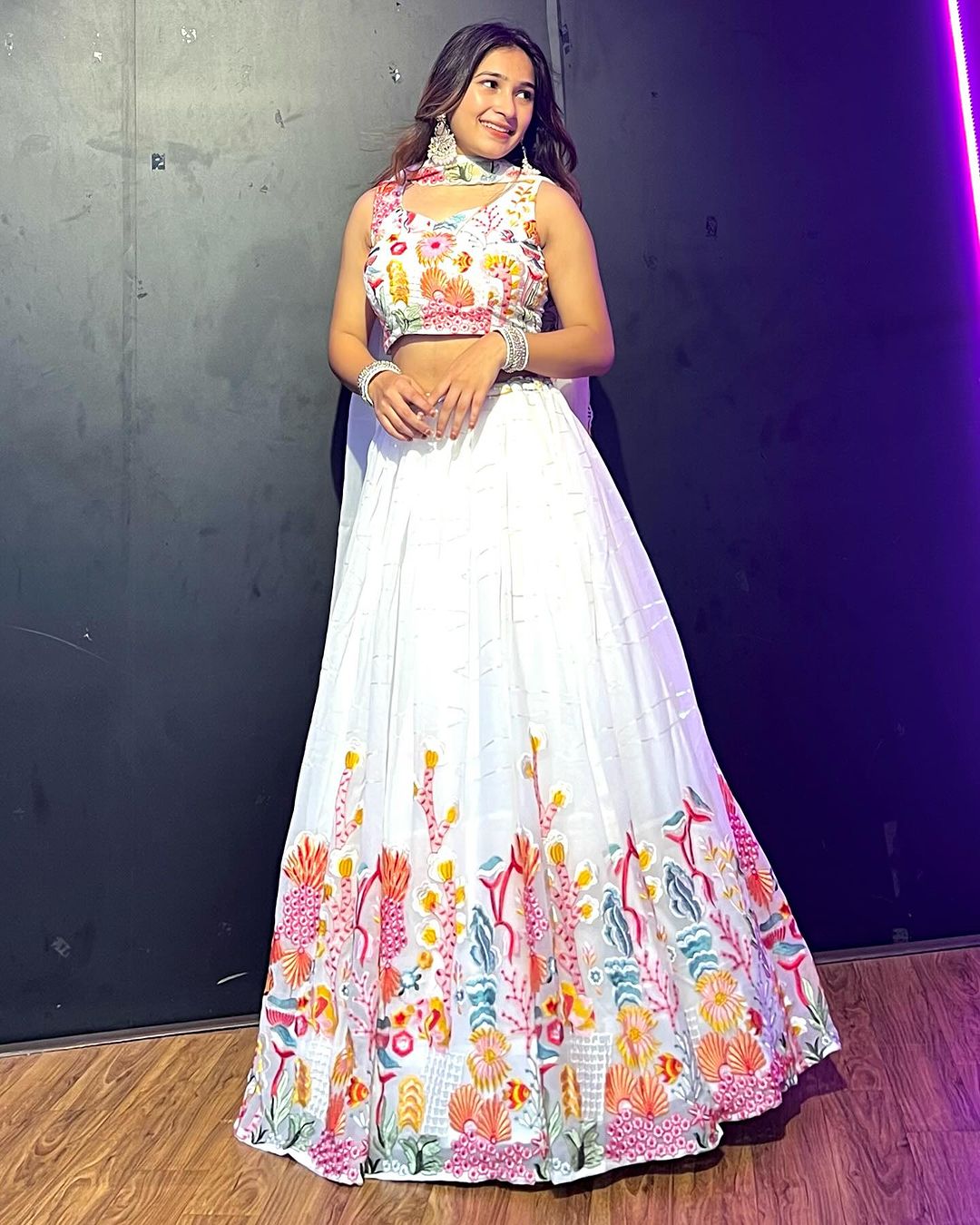 Kiran Rana in White Floral Nine Color Threaded Embroidered Soft Georgette Semi Stitched Lehenga Choli