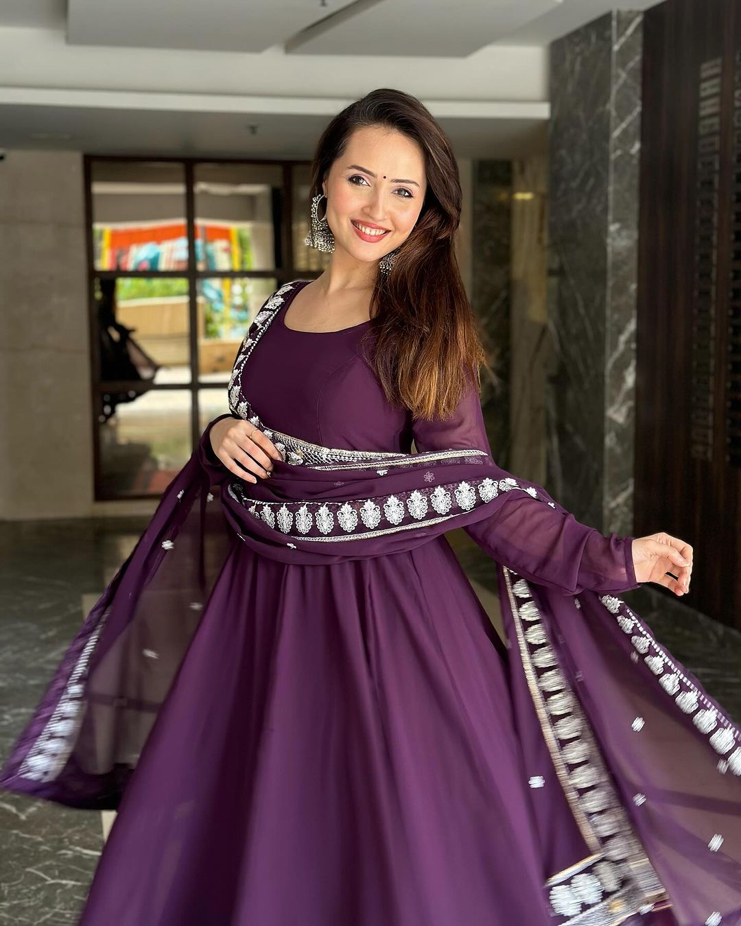 Varsha Rekhate in Wine Purple Colour Anarkali Three Piece Suit