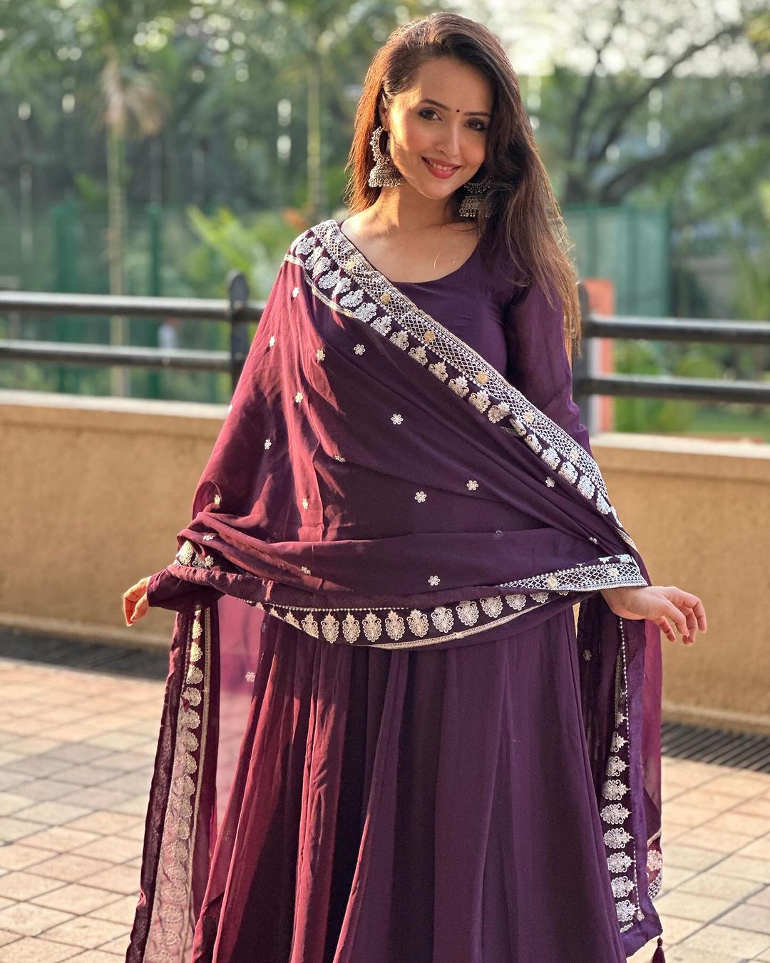 Varsha Rekhate in Wine Purple Colour Anarkali Three Piece Suit