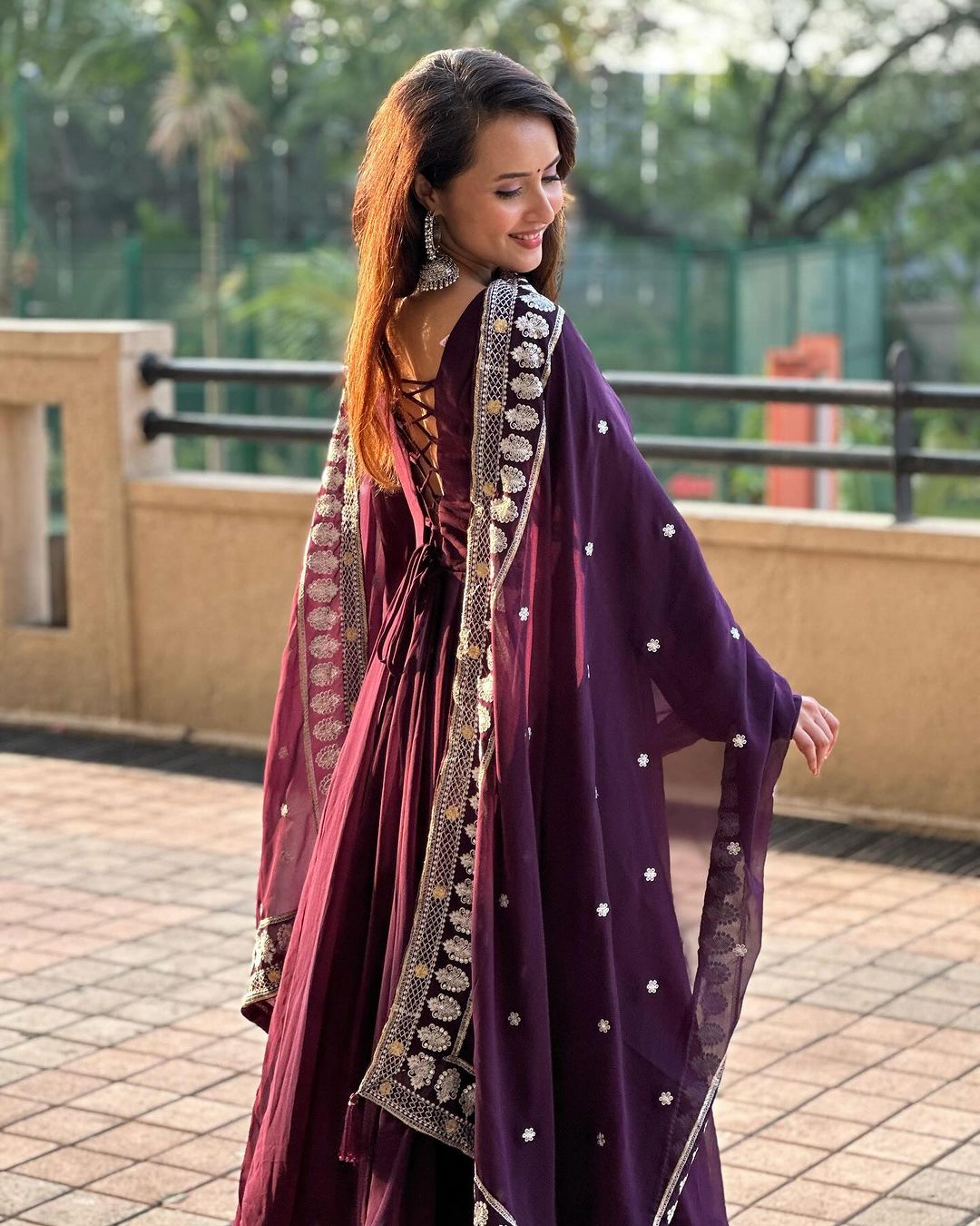 Varsha Rekhate in Wine Purple Colour Anarkali Three Piece Suit